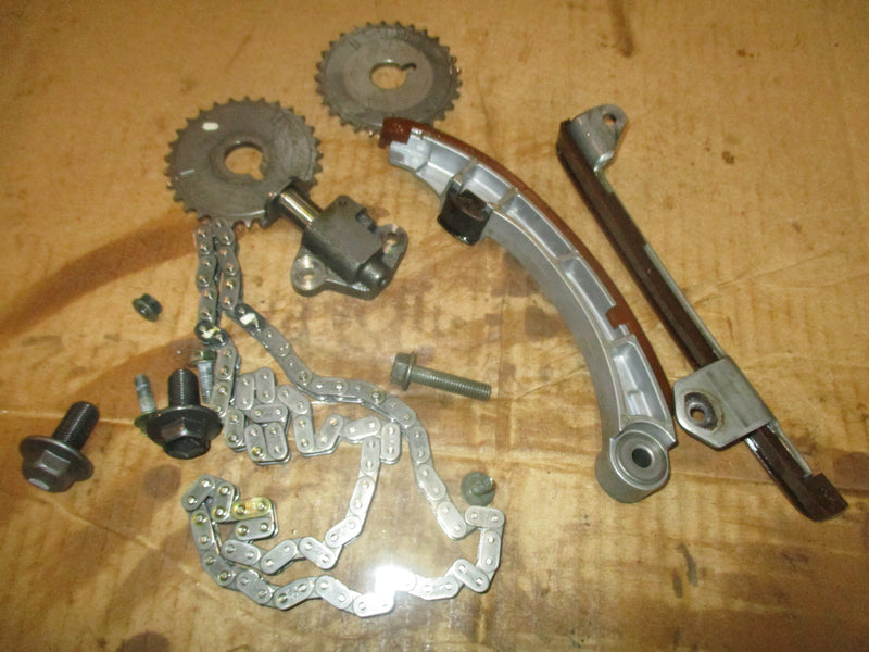 Johnson/ Suzuki 115hp 4 stroke outboard timing chain, tensioner, and guides