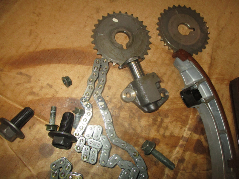 Johnson/ Suzuki 115hp 4 stroke outboard timing chain, tensioner, and guides