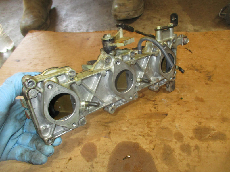 Yamaha 90hp 2 stroke outboard intake manifold w/ reeds (6H1-13641-02-94)
