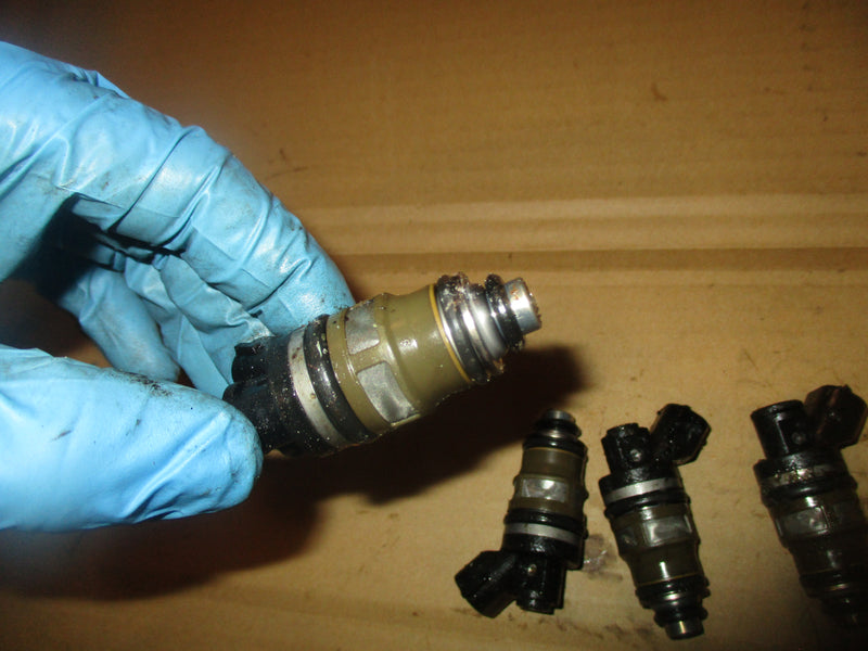 Suzuki DT140 140hp outboard fuel injector set (15710-94900)