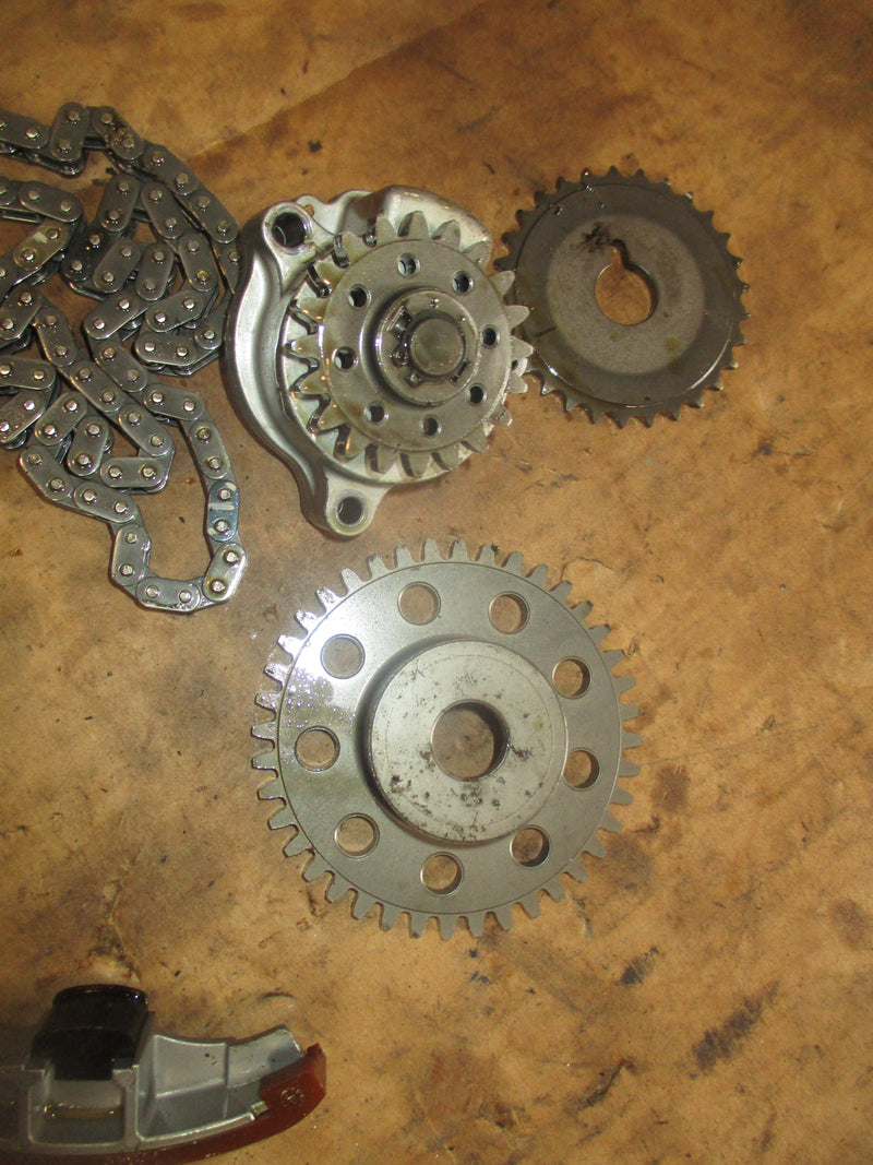 Suzuki DF90 outboard timing chain, tensioner, guides and oil pump