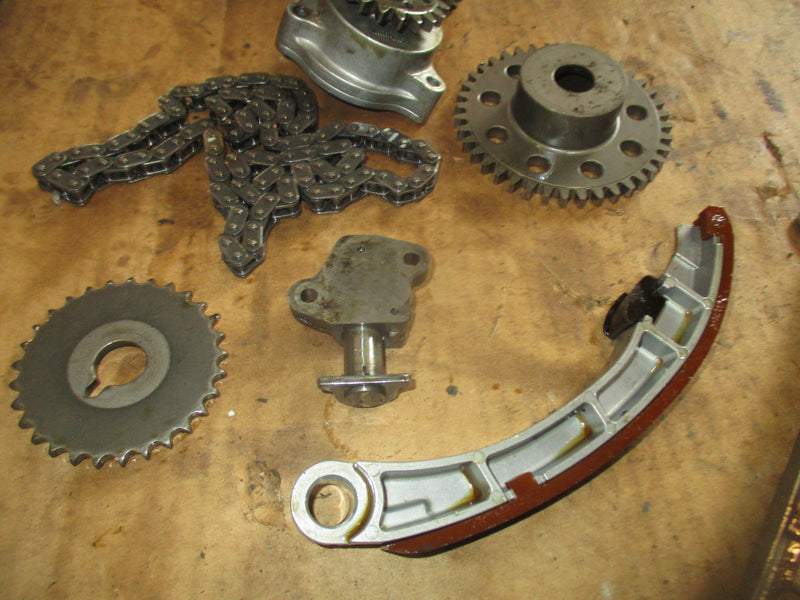 Suzuki DF90 outboard timing chain, tensioner, guides and oil pump