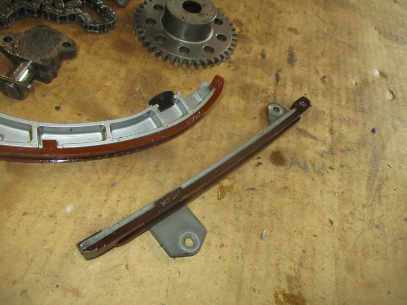 Suzuki DF90 outboard timing chain, tensioner, guides and oil pump