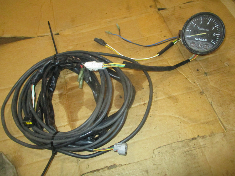 Nissan 70hp 2 stroke outboard tac with monitor gage and harness