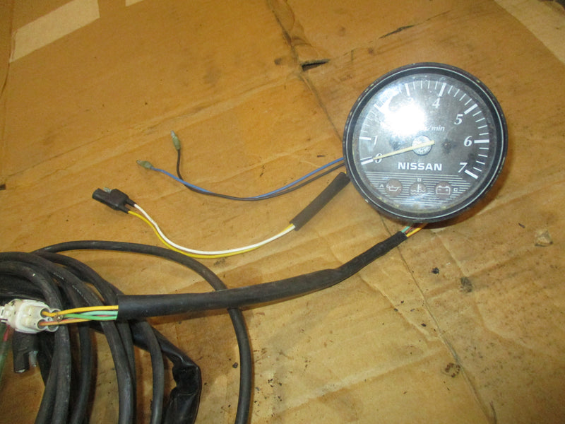 Nissan 70hp 2 stroke outboard tac with monitor gage and harness