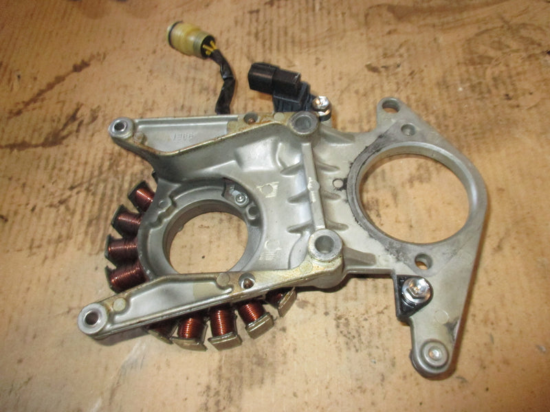 Suzuki DF70 70hp outboard stator and bracket (32120-99E00)
