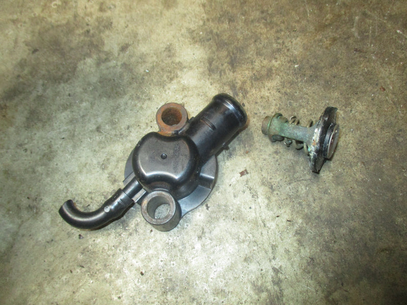 Yamaha 115hp 4 stroke outboard thermostat and cover (6EK-12411-00)