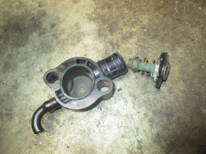 Yamaha 115hp 4 stroke outboard thermostat and cover (6EK-12411-00)