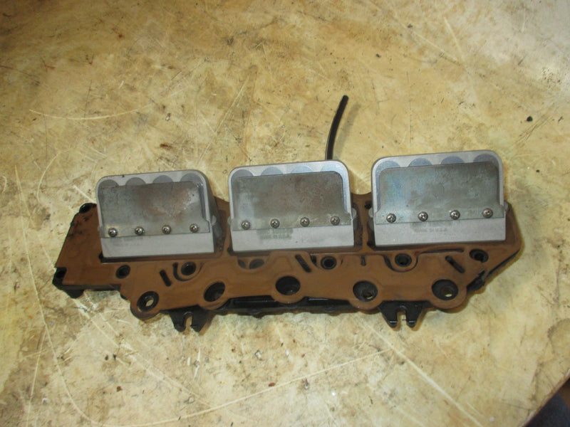 Johnson 150hp 2 stroke outboard intake manifold and reed starboard side