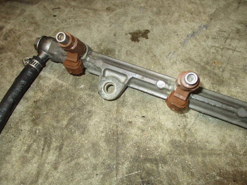 Suzuki DF150 outboard fuel rail and injector set (15751-96J00)