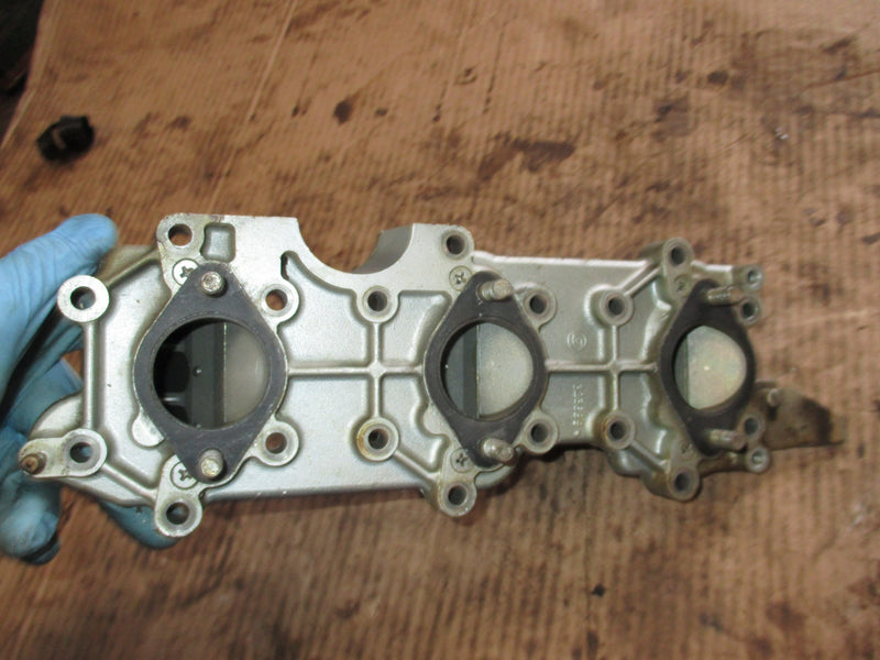Evinrude 70hp 2 stroke outboard intake manifold with reeds (323689)