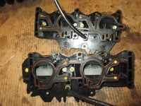 Load image into Gallery viewer, Johnson 90/115hp 60 degree 2 stroke outboard intake manifold with reeds (344629)
