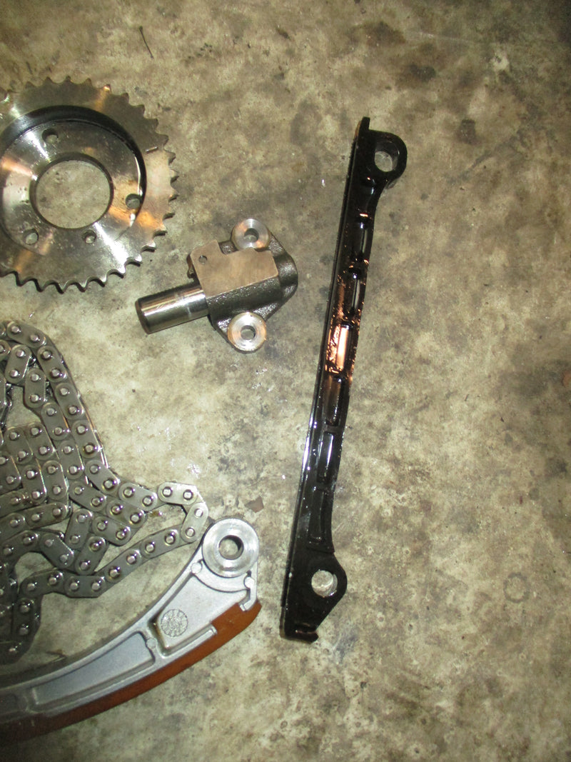 Suzuki DF50 outboard Timing chain tensioner and guides