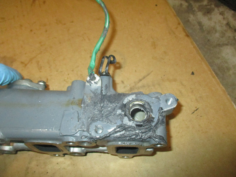 Suzuki DF60 4 stroke outboard exhaust manifold (14110-99E11)