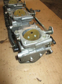 Load image into Gallery viewer, Nissan 140hp 2 stroke outboard carburetor set (3C7)
