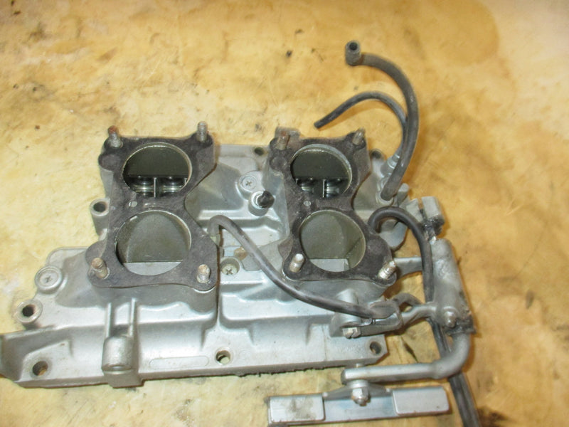 Evinrude 90hp 2 stroke outboard intake manifold with reeds (325590)