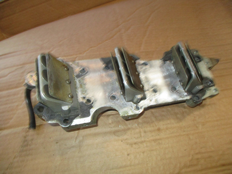 Evinrude 75hp outboard intake manifold w/ reeds (389395)