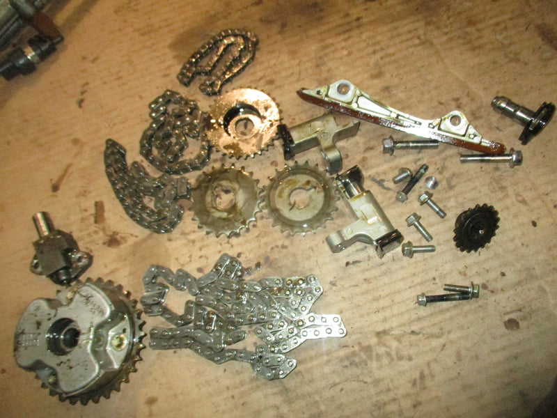 Suzuki DF300 300hp outboard timing chain tensioner and guides (12810-93J00)