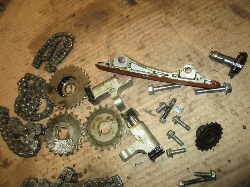 Suzuki DF300 300hp outboard timing chain tensioner and guides (12810-93J00)