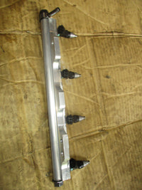 Load image into Gallery viewer, Suzuki DF140A outboard fuel rail and injector set (15751-92J00)
