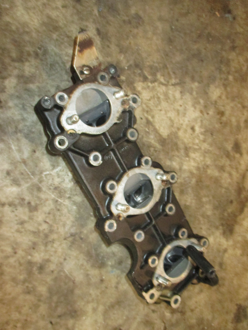 Evinrude 70hp 2 stroke outboard intake manifold with reeds (323689)