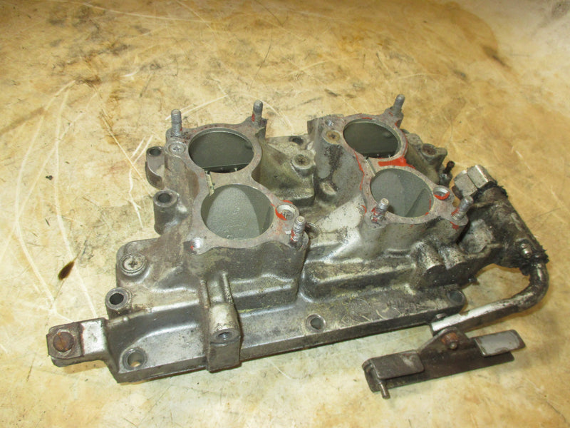 Johnson 90 degree 90-115hp 2 stroke outboard intake manifold and reeds (22930)