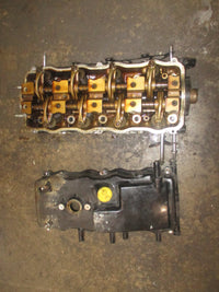Load image into Gallery viewer, Suzuki DF70 outboard cylinder head (11100-99E05)
