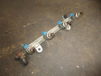 Load image into Gallery viewer, Suzuki DF70 outboard fuel rail and injector set (15751-99E00) (15710-99E00)
