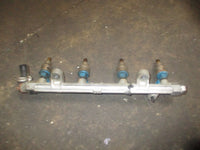 Load image into Gallery viewer, Suzuki DF70 outboard fuel rail and injector set (15751-99E00) (15710-99E00)
