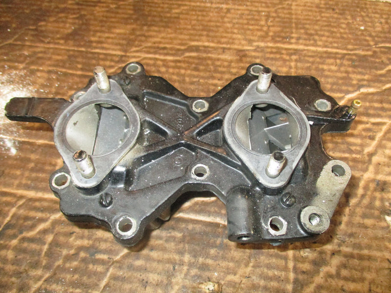 Evinrude 50hp 2 stroke outboard intake manifold w/ reeds (391780)