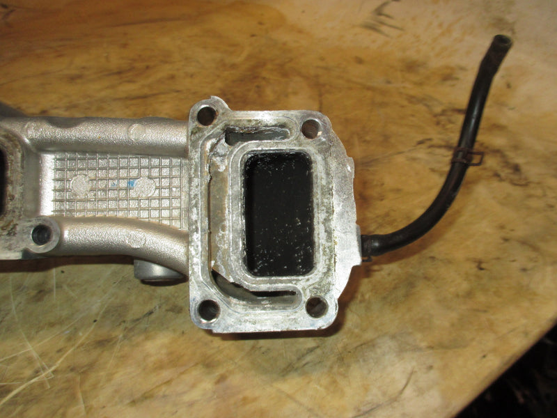 Suzuki DF70 70hp outboard exhaust manifold (14110-99E11)