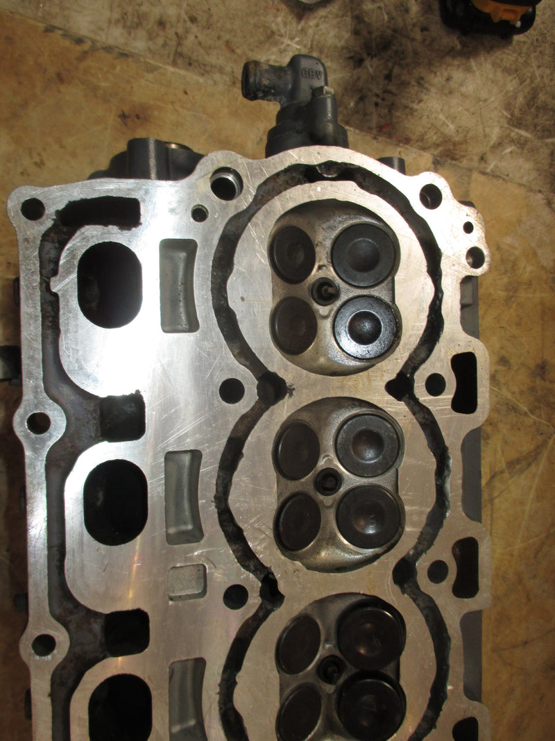 Yamaha 100hp 4 stroke outboard cylinder head (67F-10) READ DESCR.