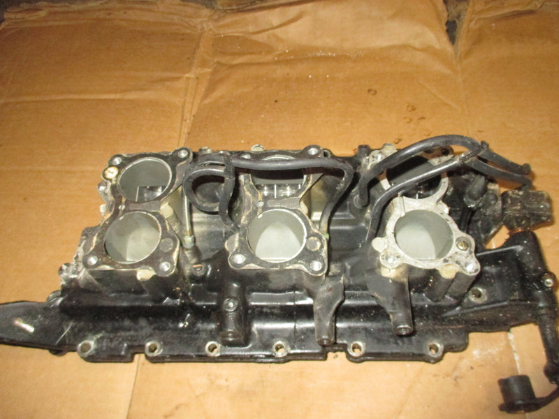 Johnson VRO 150hp 2 stroke outboard intake manifold and reeds (331836)