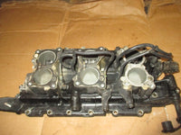 Load image into Gallery viewer, Johnson VRO 150hp 2 stroke outboard intake manifold and reeds (331836)
