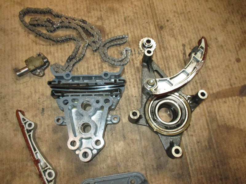 Suzuki 250hp 4 stroke outboard timing chain tensioner and guides
