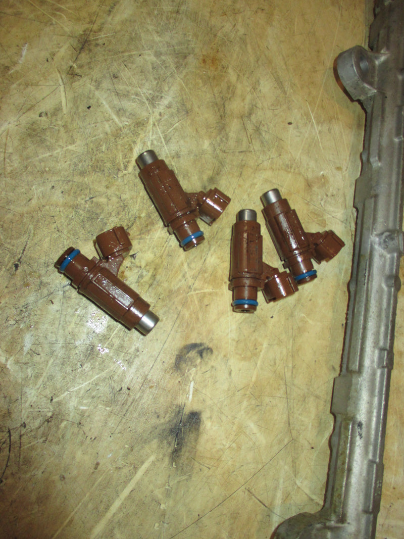 Suzuki DF200A 4CYL outboard fuel rail and injector set (15710-96J00)