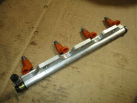 Load image into Gallery viewer, Suzuki DF90 outboard fuel rail and injectors (15710-65D00)
