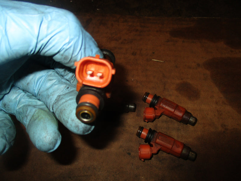 Suzuki DF90 outboard fuel injector set (15710-65D00)