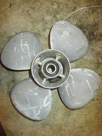 Load image into Gallery viewer, Tohatsu 9.9hp 4 stroke outboard Aluminum 4 Blade Propeller 10 X 7 High Thrust
