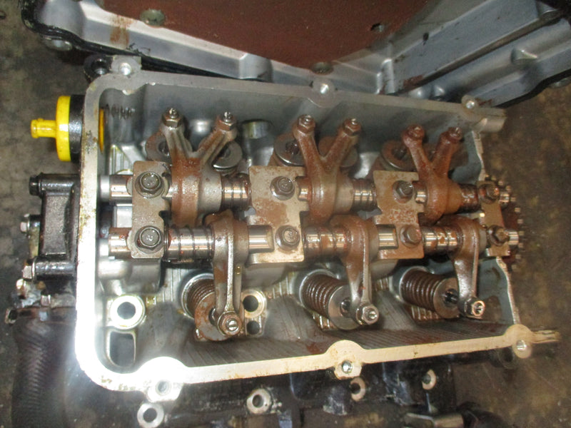 Suzuki DF25 outboard cylinder head (11100-89J00)