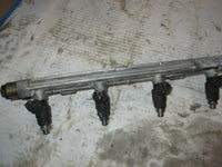 Load image into Gallery viewer, Suzuki DF70 70hp outboard fuel rail and injector set (15751-99E00)
