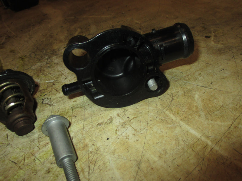 Yamaha 90hp 4 Stroke outboard Thermostat and Cover (6FP-12411-00-00)