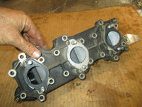 Load image into Gallery viewer, Evinrude 70hp 2 stroke outboard intake manifold w/ reeds (323689)
