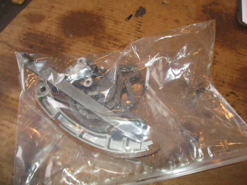 Suzuki DF90 outboard timing chain tensioner and guides (12810-90J00)