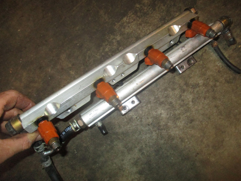 Suzuki DF115 outboard fuel rail and injector set w/ fuel cooler (15710-65D00)