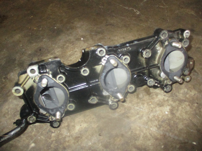 Johnson 70hp 2 stroke intake manifold w/ reeds (434126)