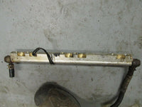 Load image into Gallery viewer, 1997 Suzuki DT 150 fuel rail 15750-92E04
