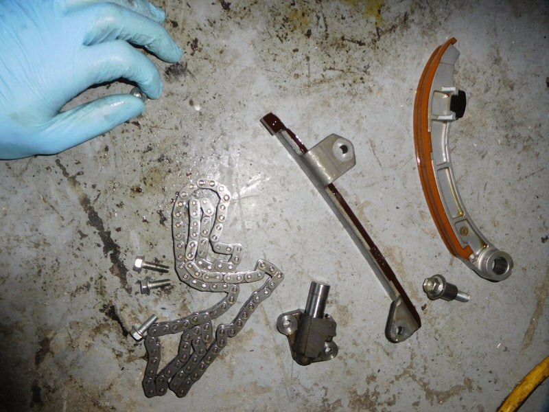 2008 Suzuki DF115 outboard timing chain tensioner and guides