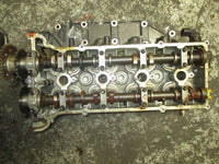 Load image into Gallery viewer, 2001 Suzuki Outboard DF115 hp 4-stroke cylinder head 11100-90J04

