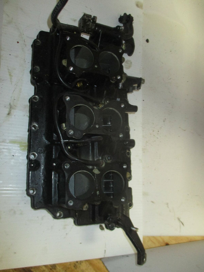 Johnson GT 150hp 2 stroke outboard intake manifold with reed valves (331836)